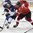 POPRAD, SLOVAKIA - APRIL 18: Switzerland's Sven Leuenberger #11 stick checks Slovakia's Jozef Balaz #19 during preliminary round action at the 2017 IIHF Ice Hockey U18 World Championship. (Photo by Andrea Cardin/HHOF-IIHF Images)